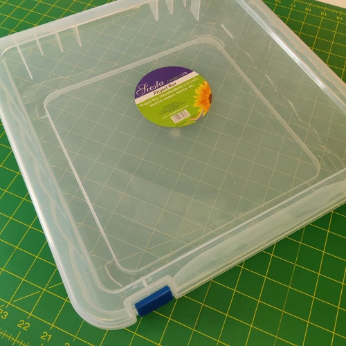 Plastic hinged storage box 12" x 12"