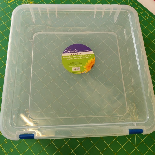 Plastic hinged storage box 12" x 12"